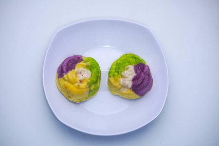 A colorful market snack made from flour and other ingredients called blooming sponge cake