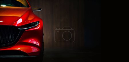 Foto de Faros rojos modernos del coche en el fondo negro, espacio de copia - Imagen libre de derechos