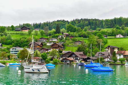 Beautiful harbor city Spiez is a small town on Lake Thun. Located on the southern coast, just 18 km from Interlaken.