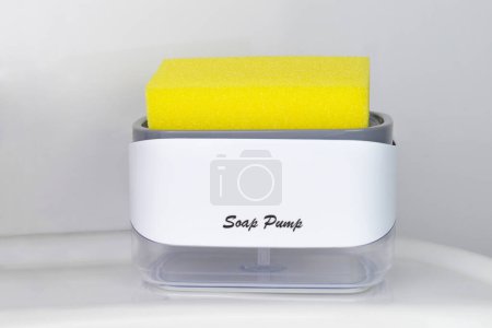 Photo for Dish Soap Dispenser and Sponge Holder for Kitchen - Royalty Free Image
