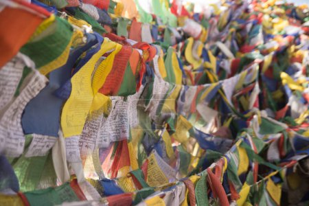 Photo for Tibetan flags waving to the wind in the himalayan mountains. High quality photo - Royalty Free Image