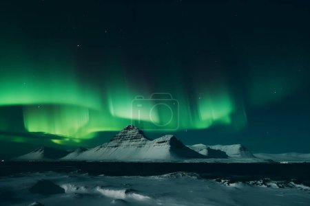 Photo for Aurora borealis shining in the sky over a snowy landscape in iceland. High quality photo - Royalty Free Image