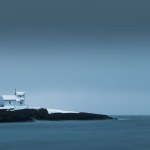 Moody Langoytangen Lighthouse, Langesund, South Coast line of Norway. Blue hour.