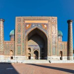 Sher Dor madrasah Islamic religious schools on Registan square with animals mosaic on fasade in Samarkand , Uzbekistan