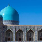 Fragment of architecture Tilya Kori Madrasah Islamic religious schools at Registan square- main square in historic Samarkand, Uzbekistan