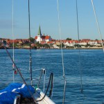 Sailboat approaching Ronne harboron on Bornholm island Denmark