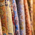 Colorful carpets in silk factory store , Samarkand , Uzbekistan. , Shallow depth f field, copy space