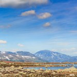 Summer mountain panorama with lake on Valdresflya - mountain plateau in Jotunheimen national park in Norway, Europe