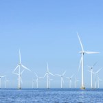 Offshore Wind Turbines Farm in the sea . Lillgrund Wind farm by the coast of Denmark and Sweden.