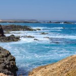  Rugged coast of Boa Vista : rocks and ocean waves. High quality photo