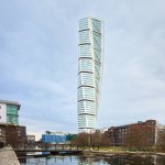 Turning Torso tower dominates Malmo skyline, a masterpiece of modern Swedish architecture by water. Concepts: innovation, design, Malmo