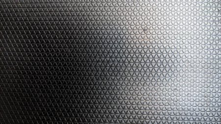 Foto de Black plastic triangle texture for background - Imagen libre de derechos