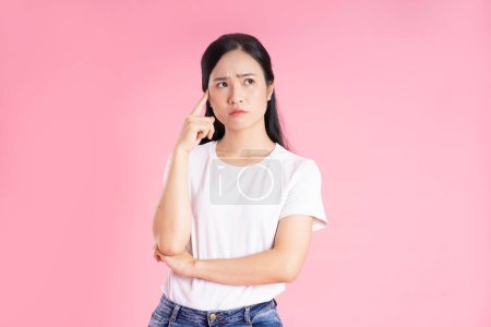 Photo for Beautiful asian girl portrait, isolated on pink background - Royalty Free Image