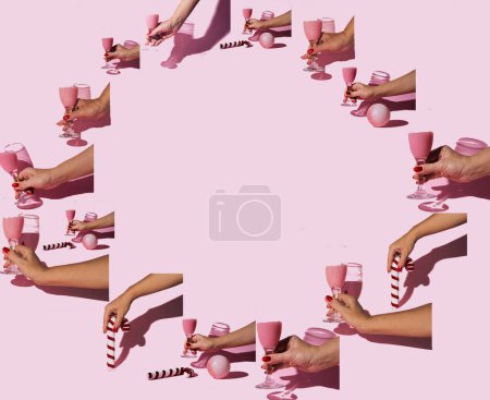 Pattern in a circular shape composed of female hands holding an ornament or a glass of champagne. Pastel pink background. Festive mood and cheerfulness.