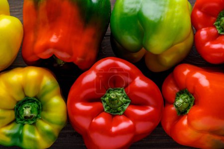 Colorful bell peppers.Close up of assorted red and yellow bell peppers(bell pepper,capcicum). Also known as Sweet pepper, Pepper or Capsicum.top view