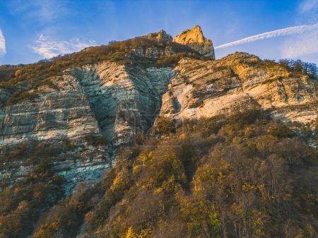 Photo for Autumn landscape in Les Trois Becs in Drme provenale. The top limestone rocks is covered with autumn colors - Royalty Free Image