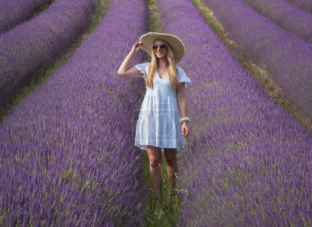 Photo for Young girl in the lavander fields. France - Provence - Royalty Free Image