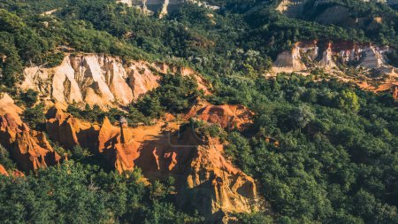 Photo for Panoramic view from above on Abstract Rustrel canyon ocher cliffs landscape. Provencal Colorado, Vaucluse, Rustrel, Colorado Provencal, France - Royalty Free Image