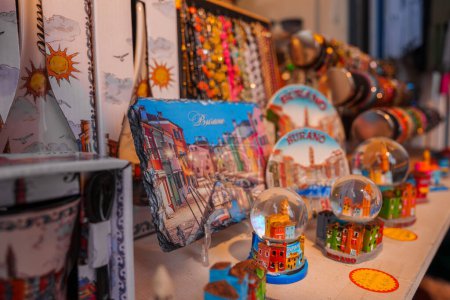 Photo for Explore a variety of Venetian souvenirs in this travel store display. From traditional trinkets to modern mementos, find the perfect keepsake to remember your trip to Venice. - Royalty Free Image