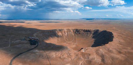 Photo for Aerial view of the Meteor Crater Natural Landmark at Arizona. Crater from a meteorite, from space. Elements of this image furnished by NASA. High quality photo - Royalty Free Image