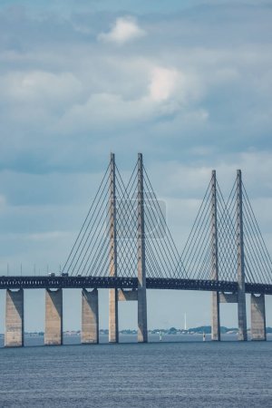 Capturing the essence of Scandinavian engineering, this image highlights the Oresund Bridges cablestayed section between Copenhagen, Denmark, and Malmo, Sweden, on a serene day.