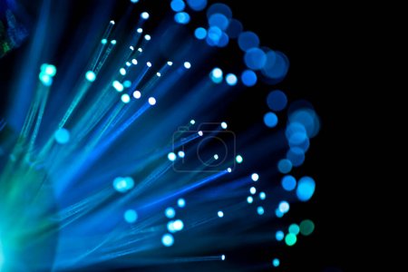 Photo for Fiber optics with blue bokeh background - Royalty Free Image