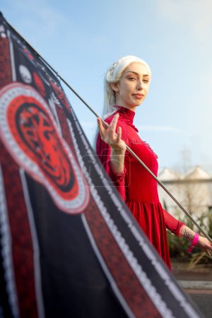 Photo for BIRMINGHAM NEC, UK - NOVEMBER 13, 2022. A cosplay girl dressed as Rhaenyra Targaryen from Game of Thrones at a UK Comic Con event - Royalty Free Image