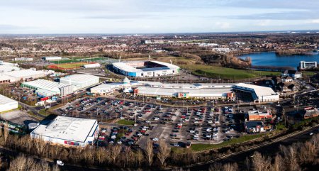 Photo for DONCASTER, UK - JANUARY 20, 2023. Aerial view of the Lakeside Village shopping centre and Doncaster Rovers Football Club Eco Power stadium - Royalty Free Image