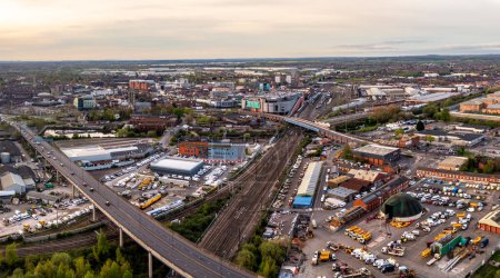 Aerial landscape view of Doncaster cityscape skyline with rail and road transport links serving the South Yorkshire city centre at sunrise