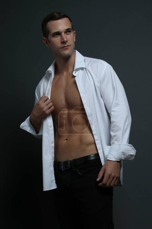 Attractive male wearing open shirt
