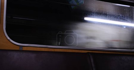 Photo for Traveling by train in tunnel. the view on the tunnel from inside the subway train through the window raiding. - Royalty Free Image