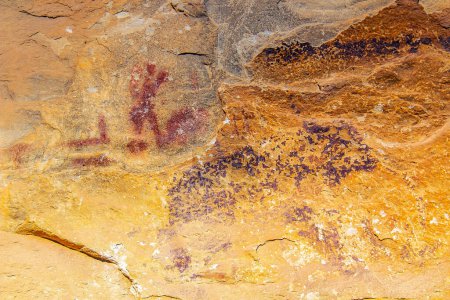 Photo for Discovering the Ancient Red Ochre Paintings on the Stones of Jebel Ousselat in Central Tunisia - Royalty Free Image