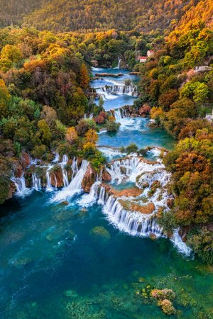 Photo for Krka, Croatia - Aerial panoramic view of the famous Krka Waterfalls in Krka National Park on a bright autumn morning with colorful autumn foliage - Royalty Free Image