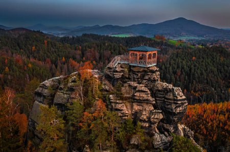 Jetrichovice, Czech Republic - Aerial view of Mariina Vyhlidka (Mary's view) lookout with a beautiful Czech autumn landscape and blue sunset sky in Bohemian Switzerland region