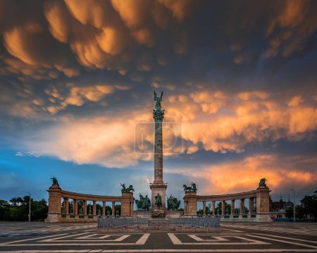 Photo for Budapest, Hungary - Unique mammatus clouds over Heroes' Square Millennium Monument at Budapest after a heavy thunderstorm on a summer afternoon sunset - Royalty Free Image