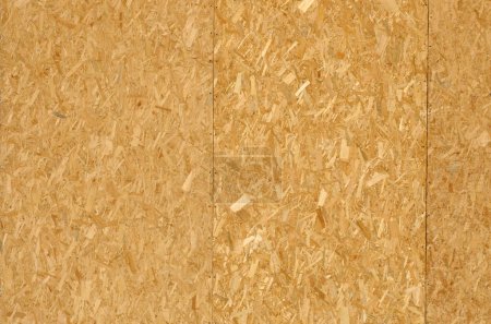 OSB texture Chipboard sheet can be used as a background. Construction concept, fresh renovation, temporary or regular building materials