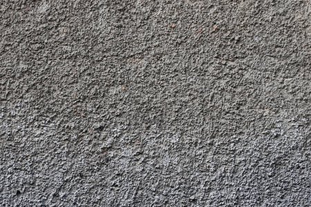 Photo for Plastered wall texture with rough relief mortar and light gray color close up - Royalty Free Image