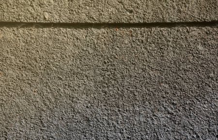 Photo for Plastered wall texture with rough relief mortar and light gray color close up - Royalty Free Image