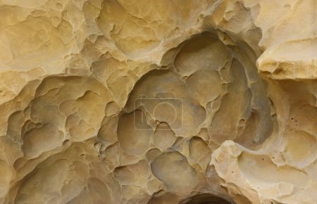 Photo for Combination of stone relief like a orange planet surface. Brown stone with abnormal relief shape with specific light - Royalty Free Image