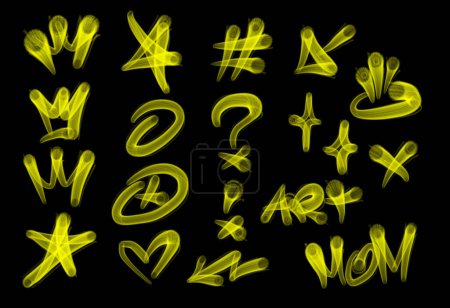 Foto de Colección de etiquetas de graffiti street art con palabras y símbolos en color amarillo sobre fondo negro - Imagen libre de derechos