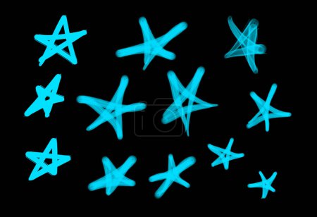 Foto de Colección de etiquetas de graffiti street art con símbolos estrella en color azul claro sobre fondo negro - Imagen libre de derechos