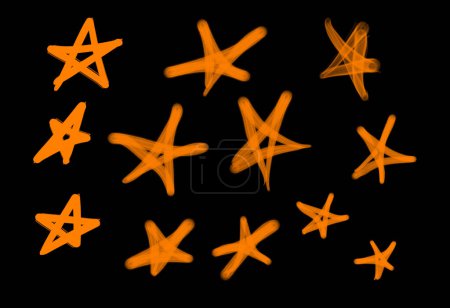 Foto de Colección de etiquetas de graffiti street art con símbolos estrella en color naranja sobre fondo negro - Imagen libre de derechos