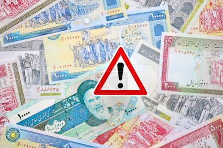 Photo for Small exclamation sign lies on pile of iranian money close up. Sanctions, ban or embargo concept - Royalty Free Image