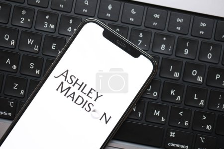 Photo for KYIV, UKRAINE - FEBRUARY 23, 2024 Ashley Madison logo of famous dating website or app on iPhone display screen close up - Royalty Free Image