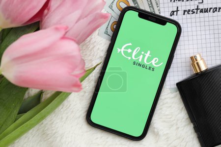 Photo for KYIV, UKRAINE - FEBRUARY 23, 2024 Elite Singles logo of famous dating website or app on iPhone display screen close up - Royalty Free Image