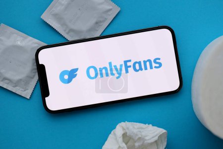 Photo for KYIV, UKRAINE - JANUARY 23, 2024 OnlyFans adult content website logo on display of iPhone 12 Pro smartphone - Royalty Free Image