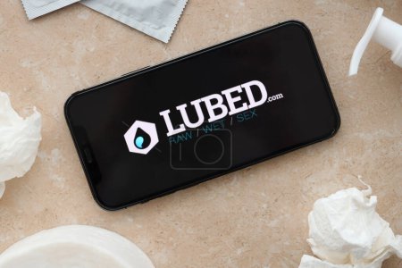 Photo for KYIV, UKRAINE - JANUARY 23, 2024 Lubed adult content website logo on display of iPhone 12 Pro smartphone - Royalty Free Image