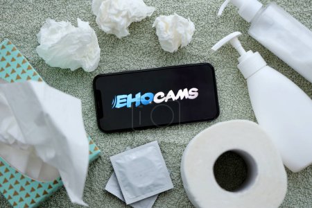 Photo for KYIV, UKRAINE - JANUARY 23, 2024 EhoCams adult content website logo on display of iPhone 12 Pro smartphone - Royalty Free Image