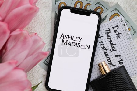 Photo for KYIV, UKRAINE - FEBRUARY 23, 2024 Ashley Madison logo of famous dating website or app on iPhone display screen close up - Royalty Free Image