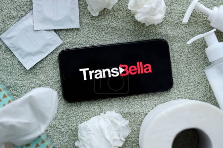 Photo for KYIV, UKRAINE - JANUARY 23, 2024 TransBella adult content website logo on display of iPhone 12 Pro smartphone - Royalty Free Image